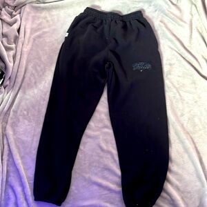 russel athletics black “Texas” varsity sweatpants with pockets